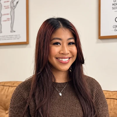 A headshot of Ayessa Gomez, a chiropractic assistant at Resolve Chiropractic.